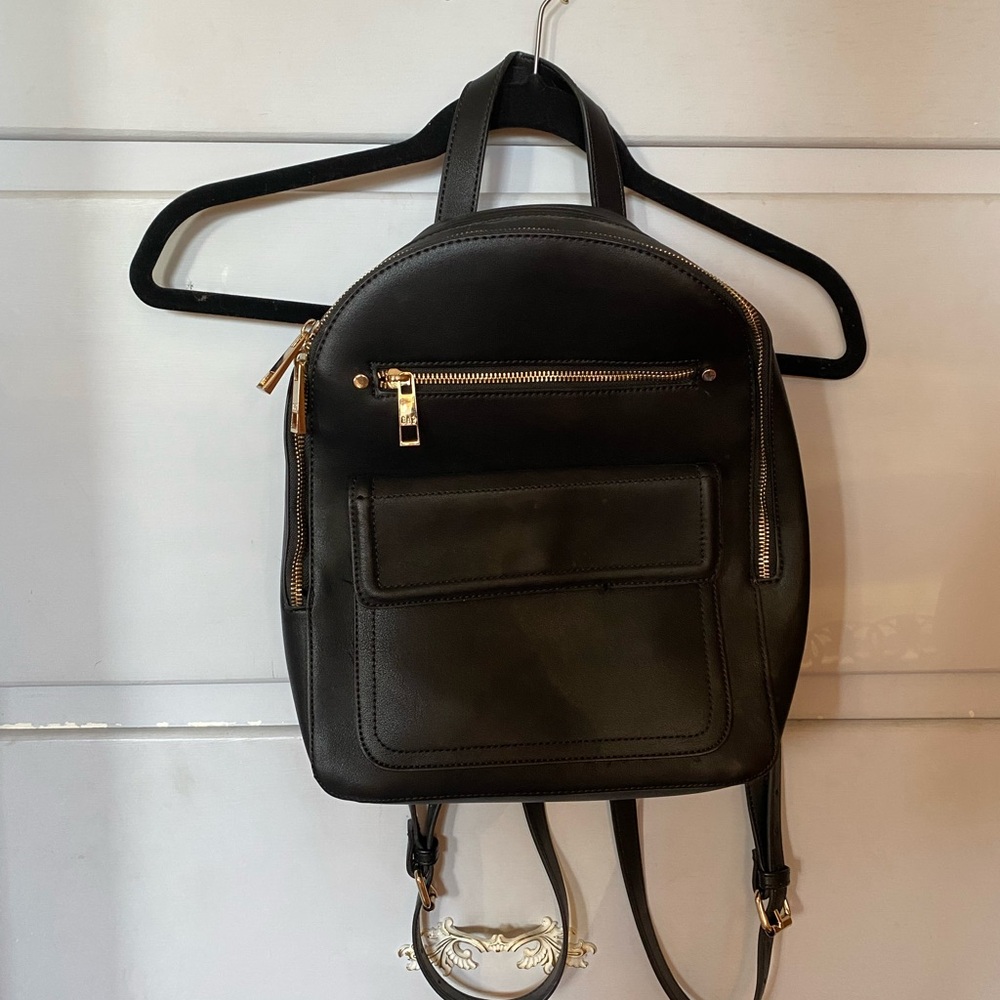 Chic Black Backpack with Gold Accents